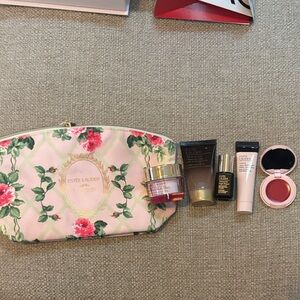 Estee Lauder Pink and Green Floral Cosmetic Bag with products